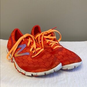 New Balance Orange and White Athletic Shoes Lightweight Design